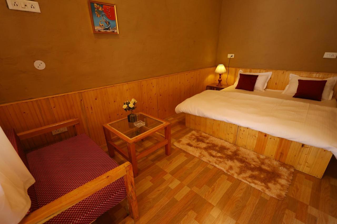 Wowstayz Tirthan Village Resort