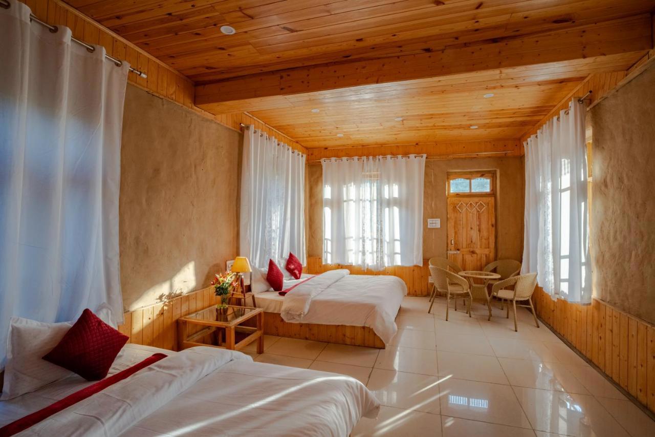 Wowstayz Tirthan Village Resort