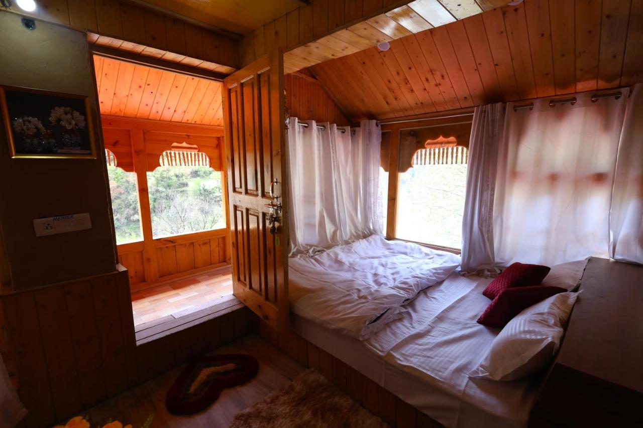Wowstayz Tirthan Village Resort