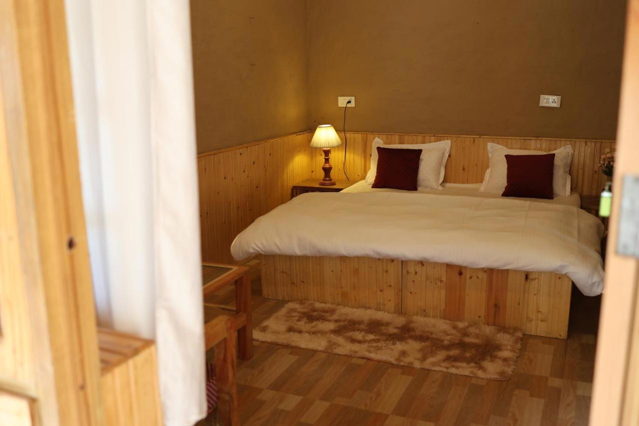 Wowstayz Tirthan Village Resort