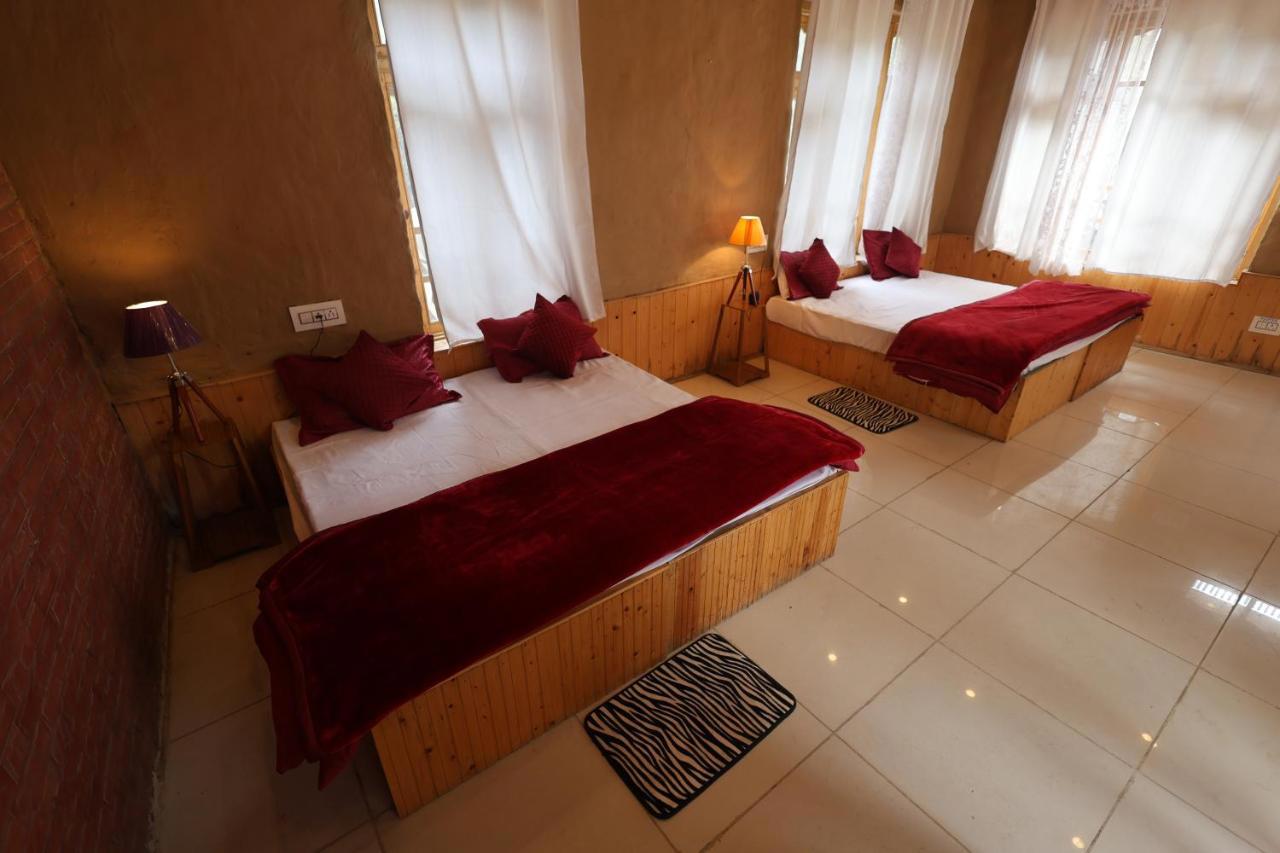 Wowstayz Tirthan Village Resort