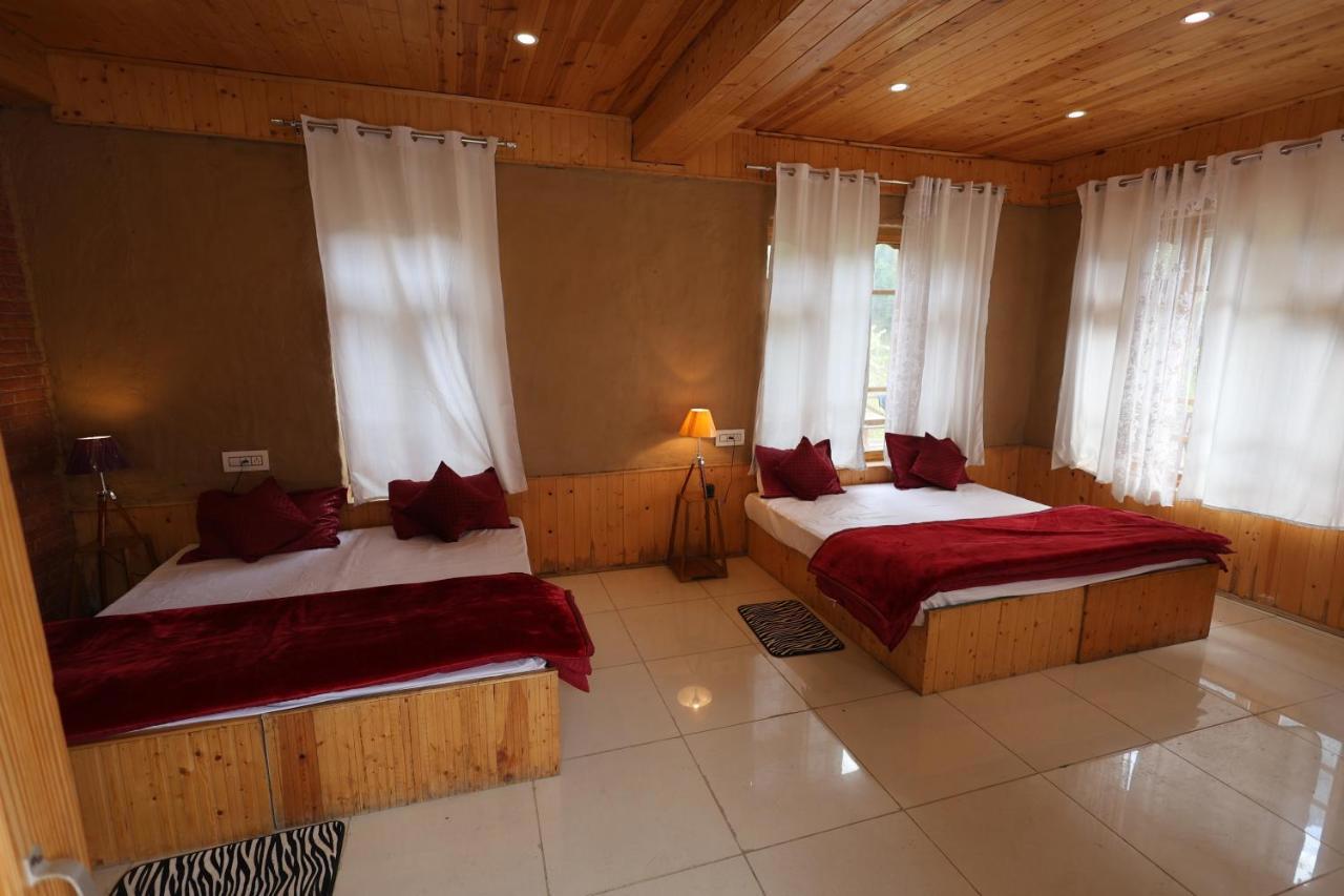 Wowstayz Tirthan Village Resort