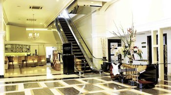 Amos Cozy Hotel & Convention Hall
