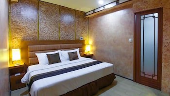 Amos Cozy Hotel & Convention Hall