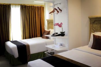 Amos Cozy Hotel & Convention Hall