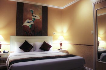 Amos Cozy Hotel & Convention Hall