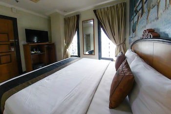Amos Cozy Hotel & Convention Hall