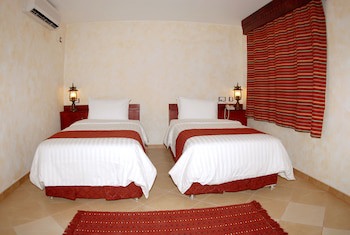Al Liwan Suites