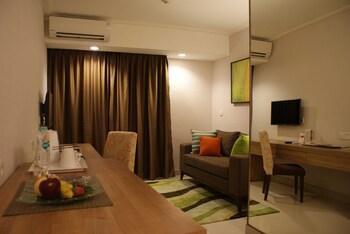 Grand Tropic Suites Hotel