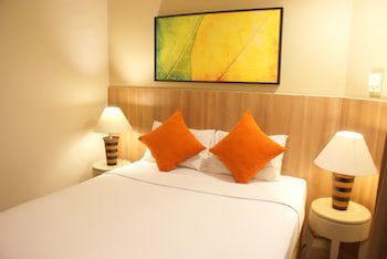 Grand Tropic Suites Hotel