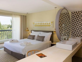 Ozadi Tavira Hotel