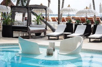 El Taj Oceanfront & Beachside Condo Hotel
