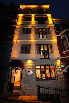 Three Apples Suites And Hotel