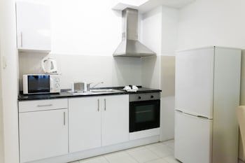 Corvin Plaza Apartments And Suites