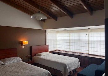 Filatelia Suites & Travel