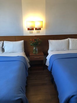 Filatelia Suites & Travel