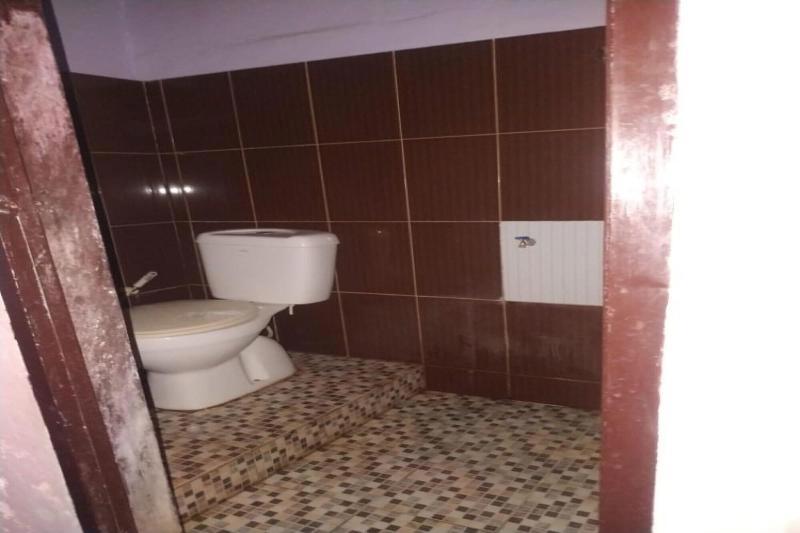 Oyo 90699 Yellow White Guesthouse Palu